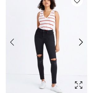 Madewell skinny black distressed jeans.